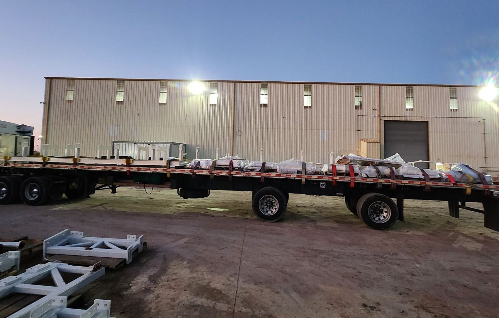 Spools & Skid Frames, Loaded for Export — Complete fabrication package secured for over-the-road shipment